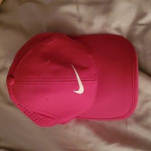 Pink Nike adjustable ball cap. One size fits all. New.